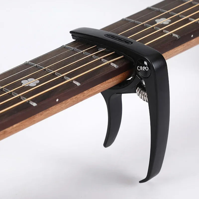 Excelente clipe de ajuste de capotraste de guitarra de metal para guitarras acústicas, elétricas, baixo, ukulele com suporte para palhetas, 1 peça