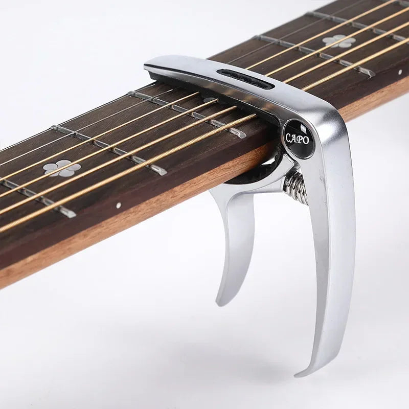 Excelente clipe de ajuste de capotraste de guitarra de metal para guitarras acústicas, elétricas, baixo, ukulele com suporte para palhetas, 1 peça